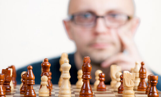 A chessplayer representing the considerations about focussing more on career or contribution